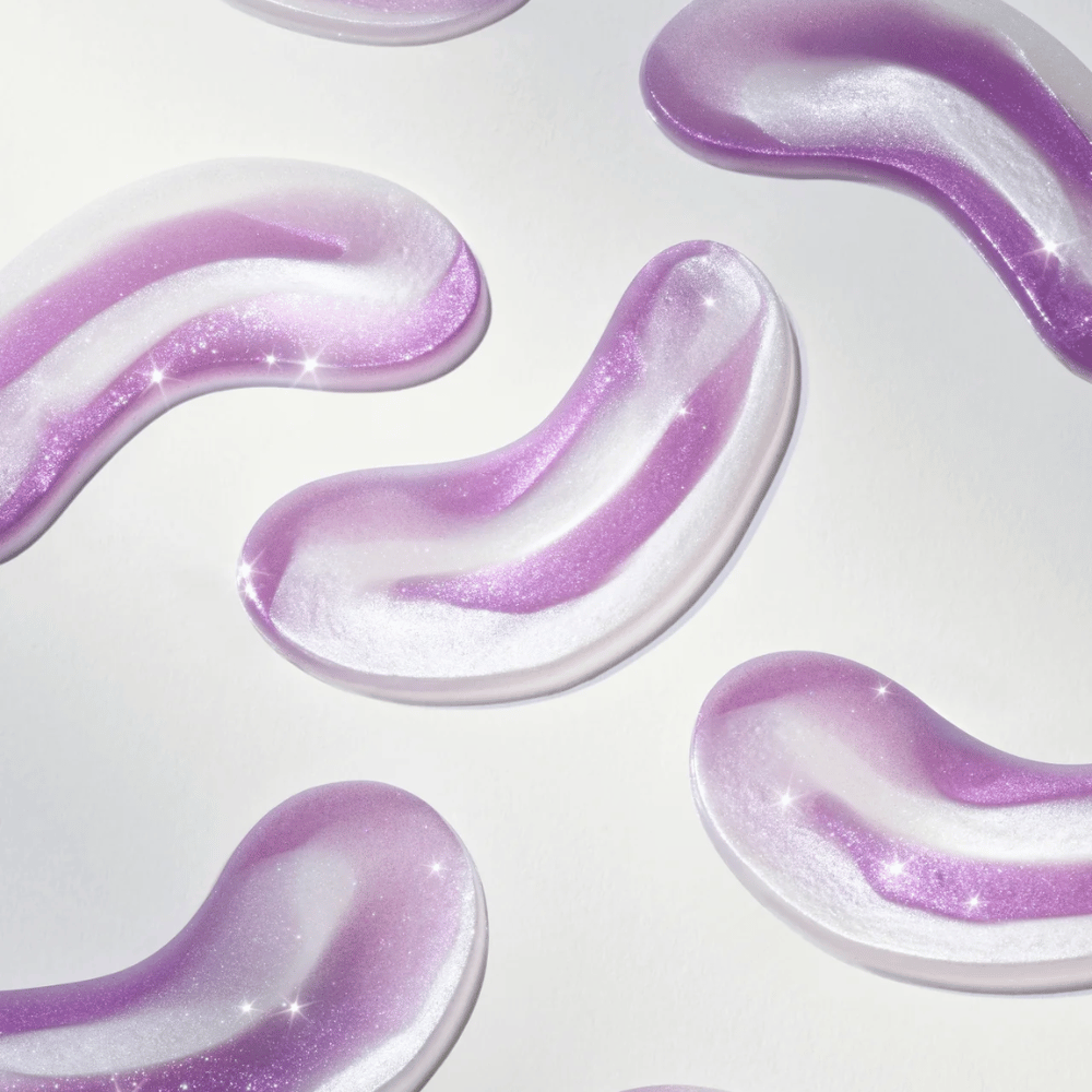 Hidrogelni obliži za oči v vijoličnem odtenku iz 360° Shot PDRN Glowing Eye Patch, zasnovani za sijaj, vlaženje in gladko kožo pod očmi.