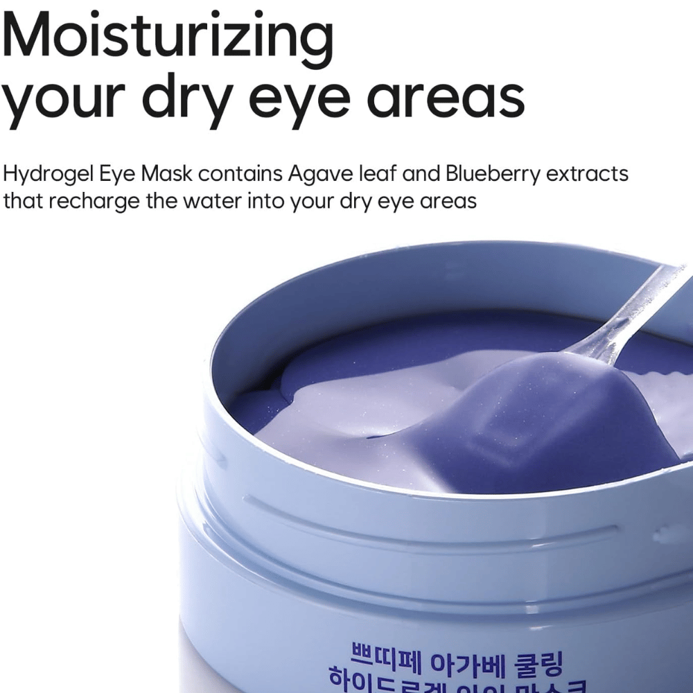 Slika izdelka Agave Cooling Hydrogel Eye Mask s poudarkom na vlaženju suhih predelov okoli oči. Slika prikazuje hidrogelno formulo in priloženo spatulo.