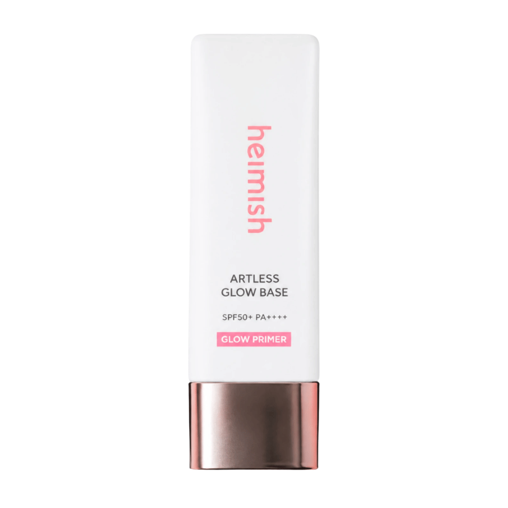 Heimish Artless Glow Base SPF50+ PA++++ – korejski sijaj primer in zaščita pred soncem v beli embalaži z rožnato zlatim pokrovčkom.
