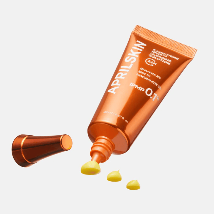 APRILSKIN Carrotene IPMP Clearing Solution spot treatment proti mozoljem in nečisti koži, koncentrirana formula z IPMP 0.1 % in piling kislinami