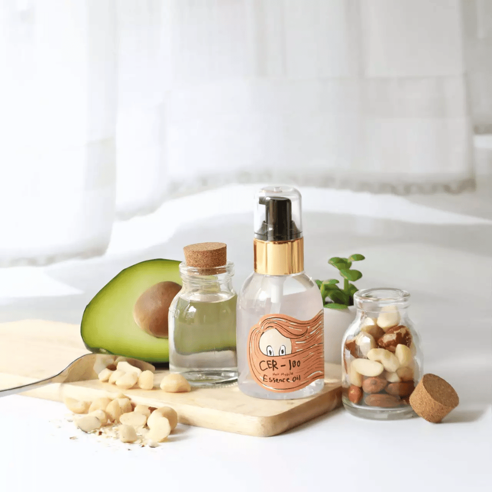 Elizavecca CER-100 Hair Muscle Essence Oil – korejsko olje za lase z avokadom in naravnimi olji, ki pomaga vlažiti, krepiti in daje sijaj suhim in poškodovanim lasem.