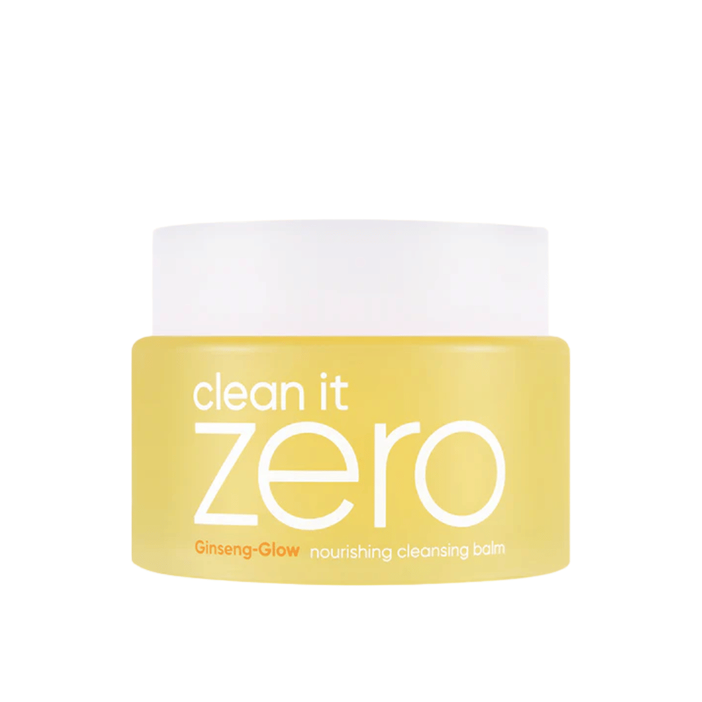 Clean It Zero Ginseng-Glow Nourishing Cleansing Balm v rumeni posodi na beli podlagi, vlažilni čistilni balzam od BANILA CO, ki učinkovito odstranjuje ličila in nečistoče.