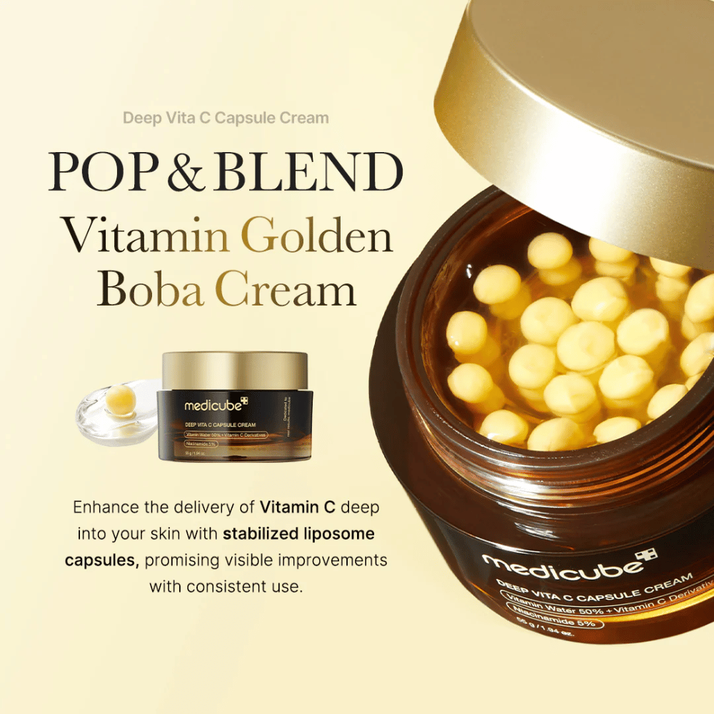 Embalaža "Medicube Deep Vita C Capsule Cream," kreme, obogatene z vitaminom C, ki vsebuje stabilizirane liposomske kapsule za učinkovito prodiranje v kožo. Besedilo "POP & BLEND Vitamin Golden Boba Cream" poudarja lastnosti izdelka, vizualna predstavitev pa prikazuje kapsule, ki obljubljajo vidne izboljšave z neprekinjeno uporabo.