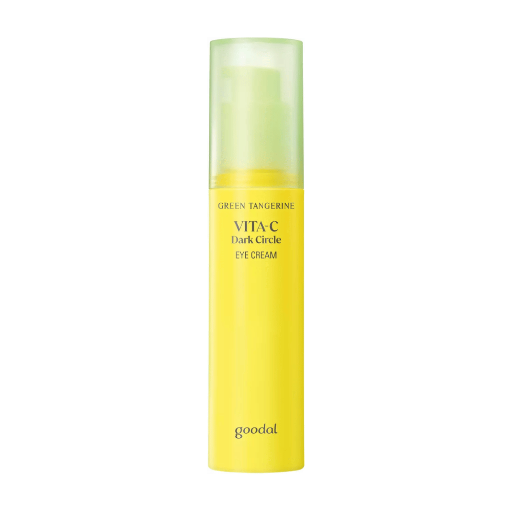 Steklenica Goodal Green Tangerine Vita C Dark Circle Eye Cream 30ml na beli podlagi z vitaminom C.
