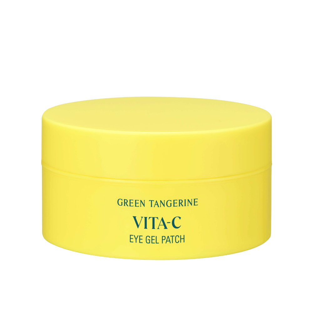 Rumena posoda z oznako "GREEN TANGERINE VITA-C EYE GEL PATCH", verjetno očesne maske, ki vsebujejo vitamin C.