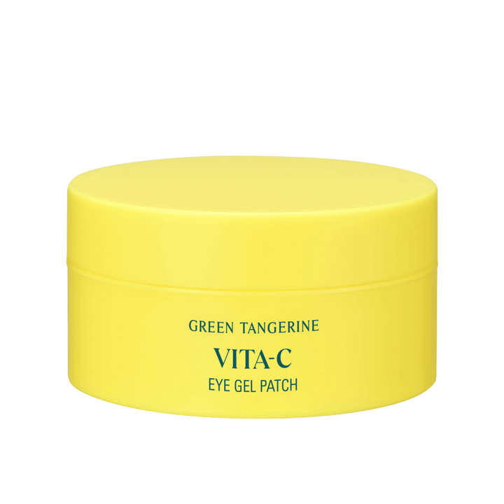 Rumena posoda z oznako "GREEN TANGERINE VITA-C EYE GEL PATCH", verjetno očesne maske, ki vsebujejo vitamin C.