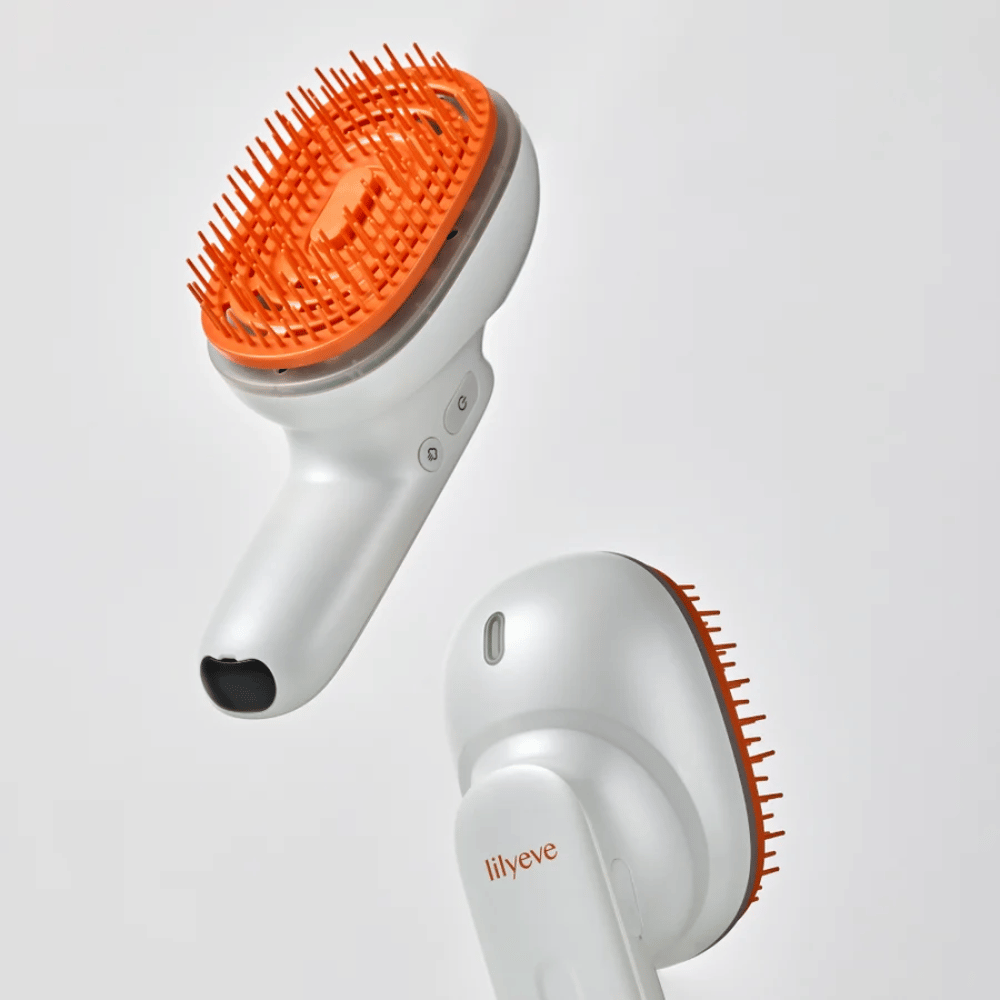LILYEVE GrowTurn Brush Steam Booster – sprednja in zadnja stran z ergonomskim ročajem in oranžnimi ščetinami