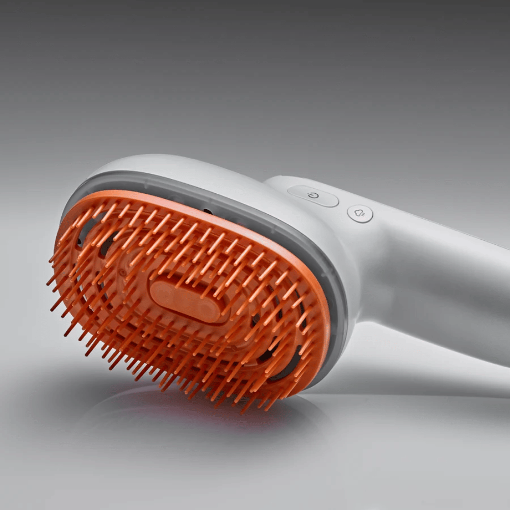 LILYEVE GrowTurn Brush Steam Booster – bližnji posnetek glave krtače in kontrolnih gumbov