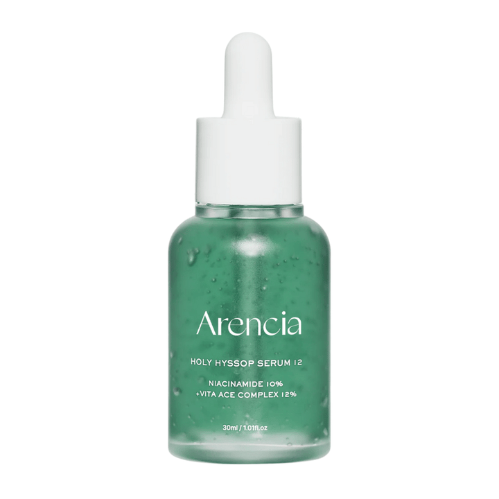 Arencia Holy Hyssop Serum 12 v zeleni steklenici s pipeto, obrazni serum z niacinamidom 10 % in vitamin ACE-kompleksom 12 %.