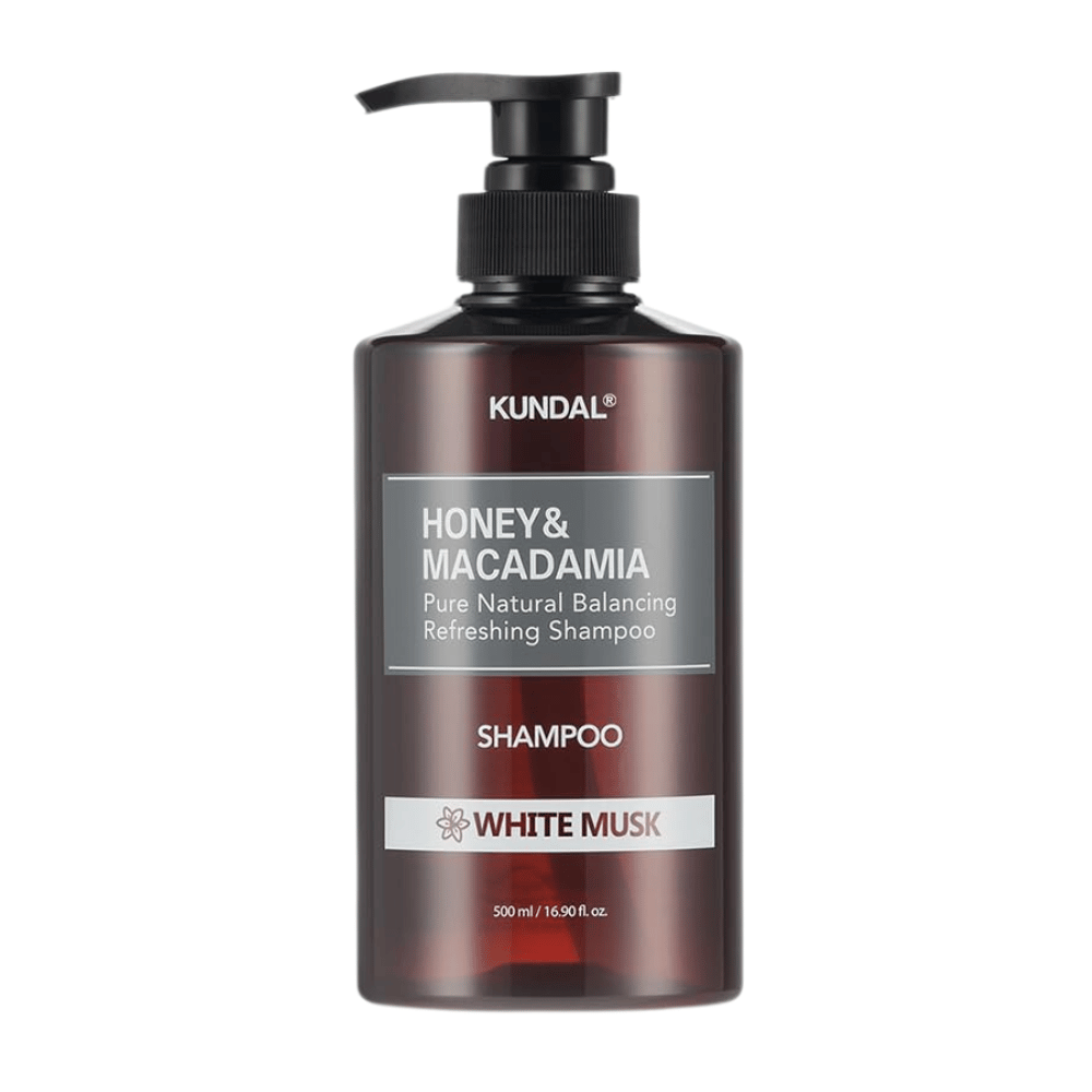 KUNDAL Honey & Macadamia Nature Shampoo White Musk v rjavi plastični steklenici s črpalko, 500 ml.