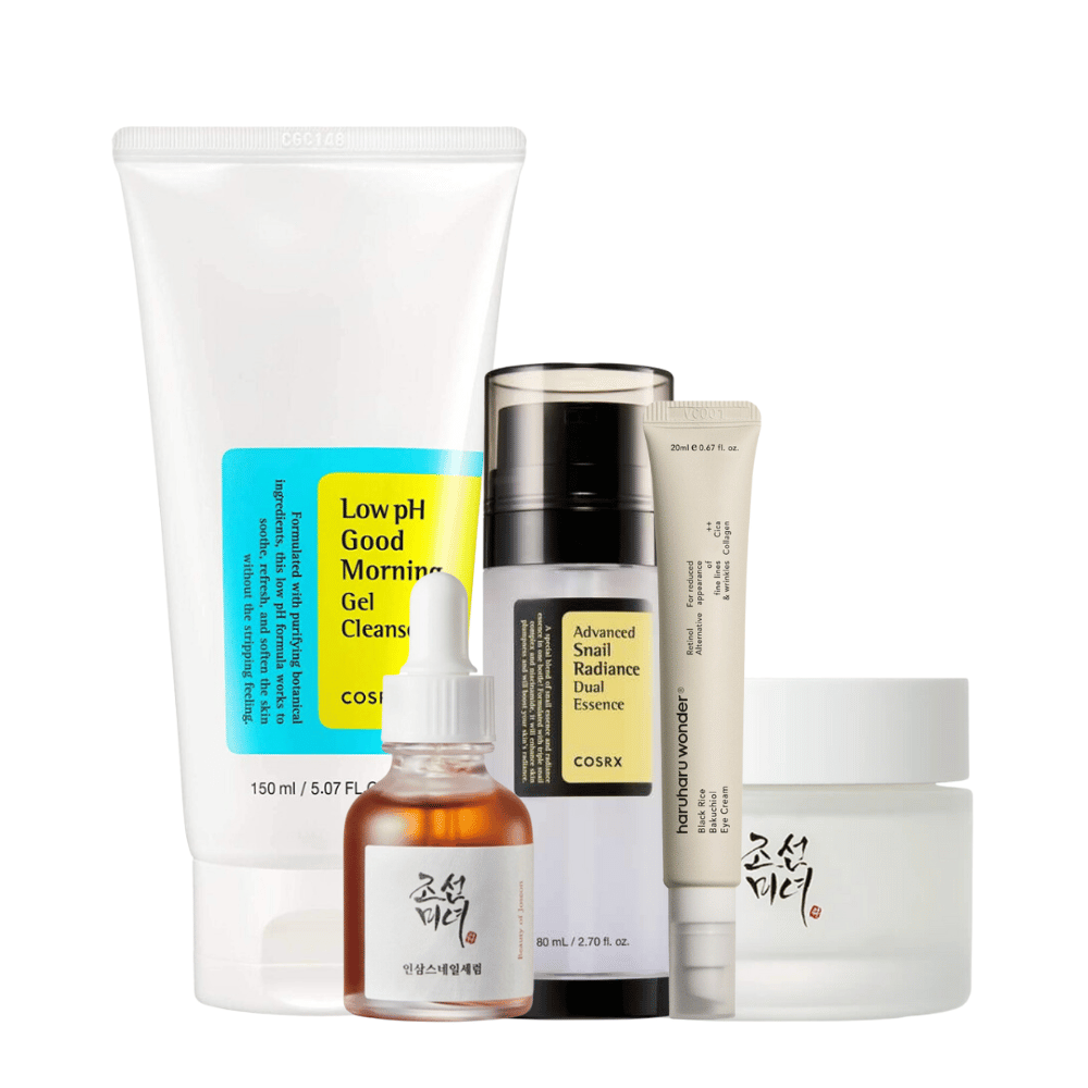 Izbor K-Beauty Mature Skin Time Revers Kit za znake staranja na beli podlagi.