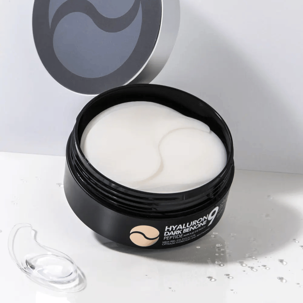 Povečava Hyaluron Dark Benone Peptide 9 Ampoule Eye Patch – mehki hidrogelni obliži za oči, ki pomagajo navlažiti, zgladiti in poživiti kožo pod očmi.