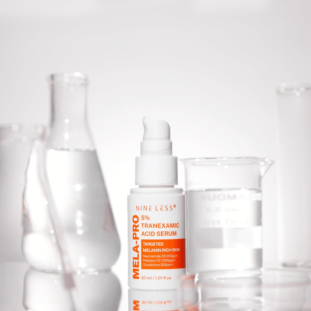 NINE LESS MELA-PRO 5% Tranexamic Acid Serum s traneksamsko kislino in niacinamidom, izravnalni obrazni serum za bolj jasno kožo.