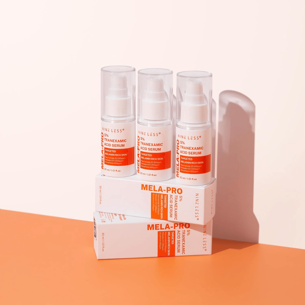 Tri NINE LESS MELA-PRO 5% Tranexamic Acid Serum 30 ml, posvetlitveni serum z niacinamidom in glutationom za kožo bogato z melaninom.