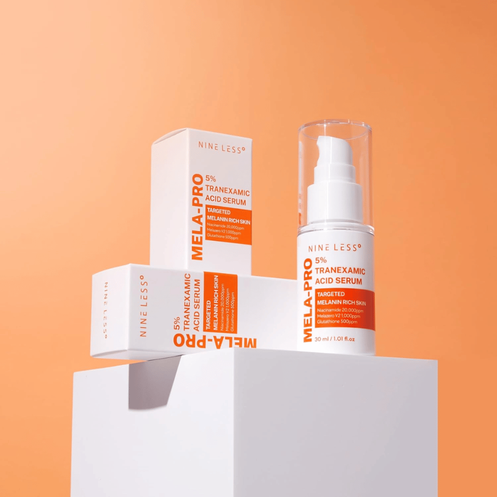 NINE LESS MELA-PRO 5% Tranexamic Acid Serum 30 ml z embalažo, serum za sijaj proti pigmentnim madežem in neenakomernemu tenu kože.