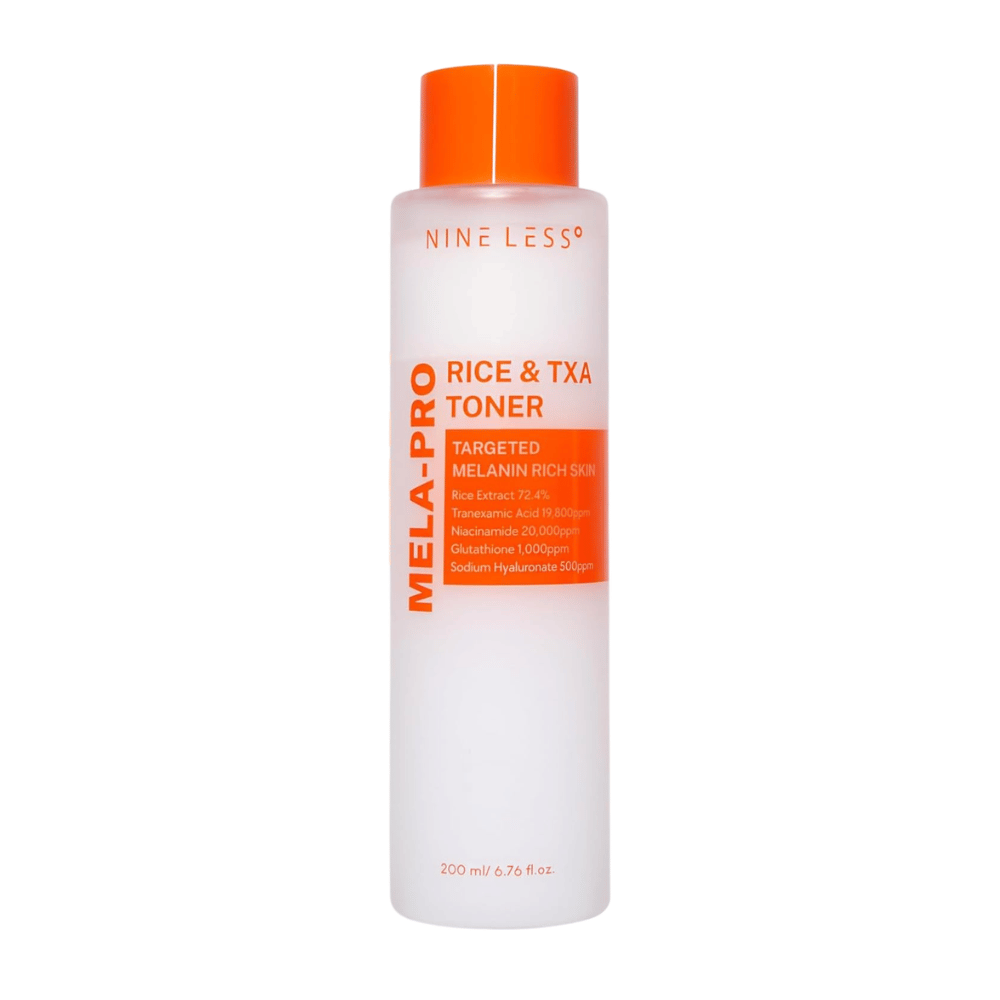 6. NINE LESS MELA-PRO Rice & TXA Toner 200 ml – bela steklenička tonika z oranžnim pokrovčkom in etiketo na belem ozadju