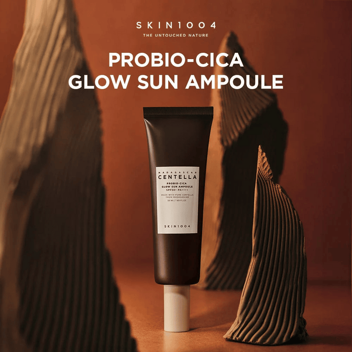 SKIN1004 Madagascar Centella Probio-Cica Glow Sun Ampoule – hranljiva zaščita pred soncem z SPF50+ PA++++, ki daje sijaj, ščiti in krepi kožno pregrado s probiotiki in centelo iz Madagaskarja. Primerna tudi za občutljivo kožo.