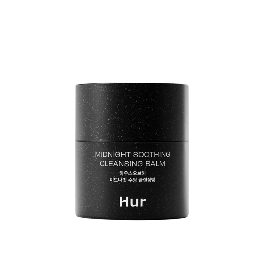 Kako Midnight Soothing Cleansing Balm na beli podlagi. Nežen čistilni balzam, ki stopi ličila, zaščito pred soncem in sebum, ne da bi izsušil kožo.