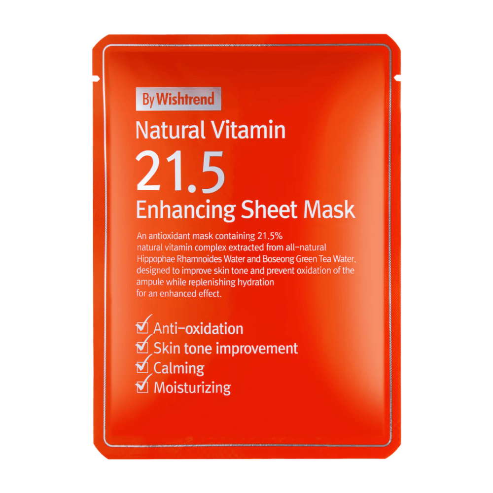 By Wishtrend Natural Vitamin 21.5% Enhancing Sheet Mask v rdeči embalaži z belim besedilom, ki poudarja njene antioksidativne in vlažilne lastnosti.