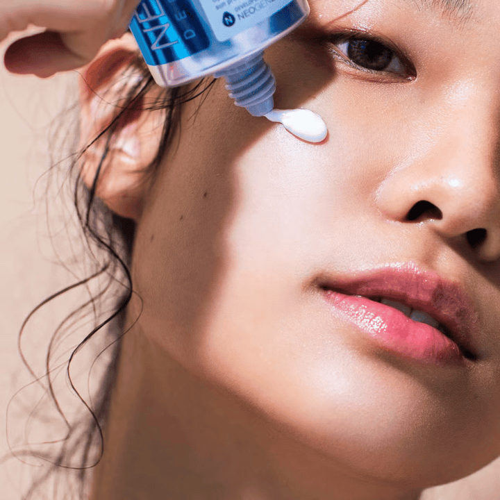 Neogen Dermalogy Day-Light Protection Airy Sunscreen SPF50 50ml – vlažilna korejska sončna krema s širokim spektrom UV-zaščite, nanesena na kožo.