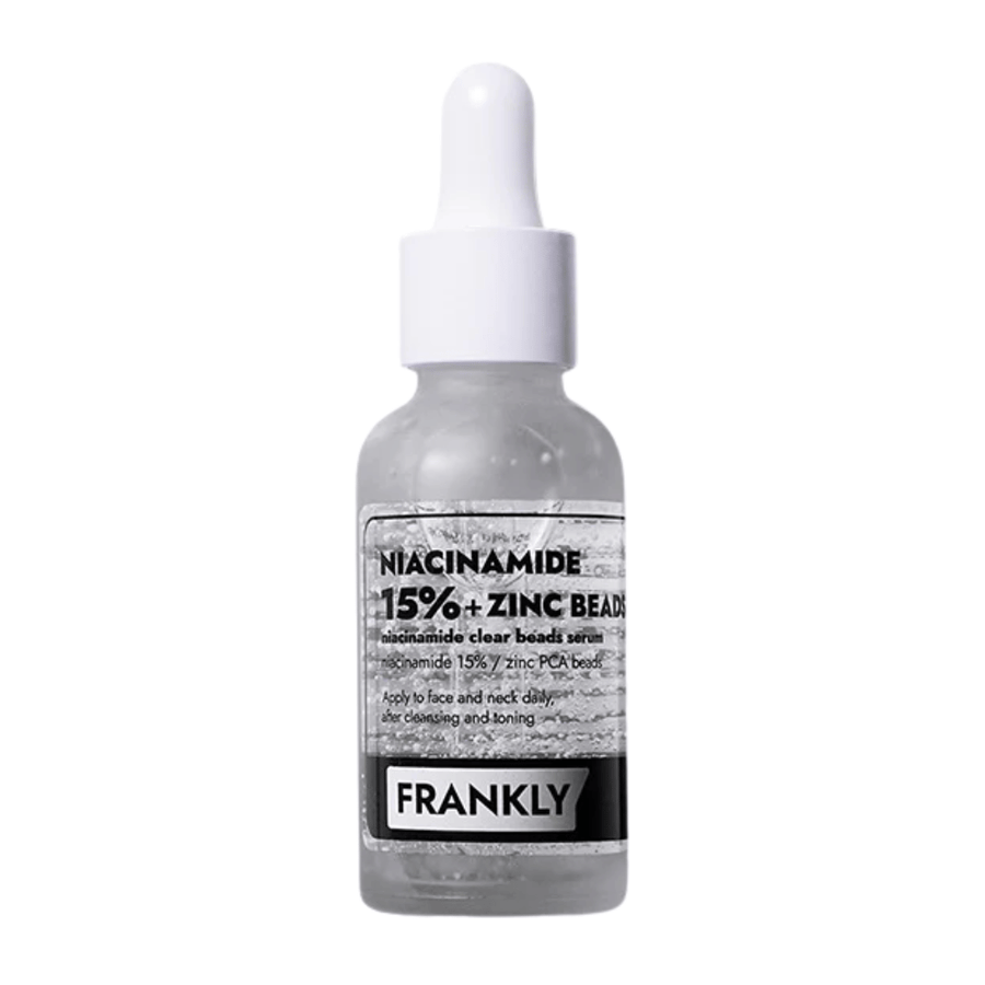 Slika izdelka FRANKLY Niacinamide 15% + Zinc Beads Serum v steklenički s pipeto. Serum, ki uravnava, pomirja in izboljšuje jasnost kože.