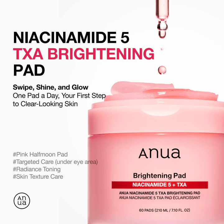 Roza lonček z Anua Niacinamide 5 TXA Brightening Pad in polovično oblikovanimi blazinicami, z napisom, ki poudarja sijaj, enakomernejši ten kože in ciljno nego z niacinamidom in traneksamsko kislino.