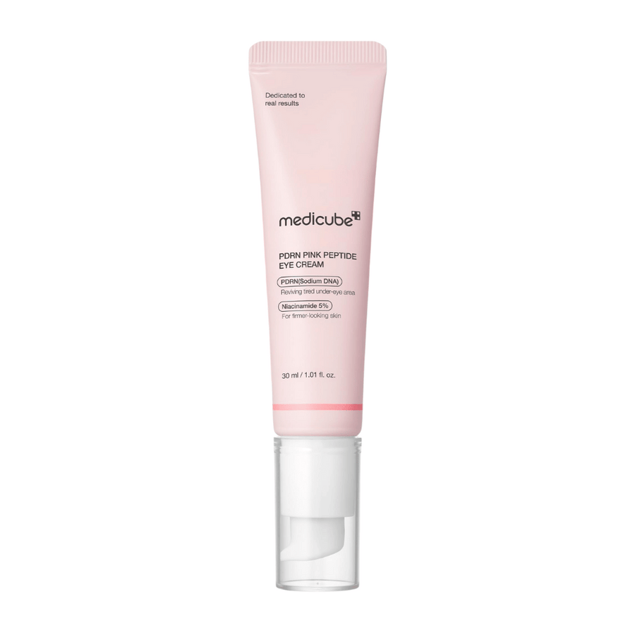 Medicube PDRN Pink Peptide Eye Cream v roza tubi, 30 ml. Krema za oči s PDRN in 5 % niacinamida, ki poživlja utrujeno kožo pod očmi in daje čvrstejši videz.