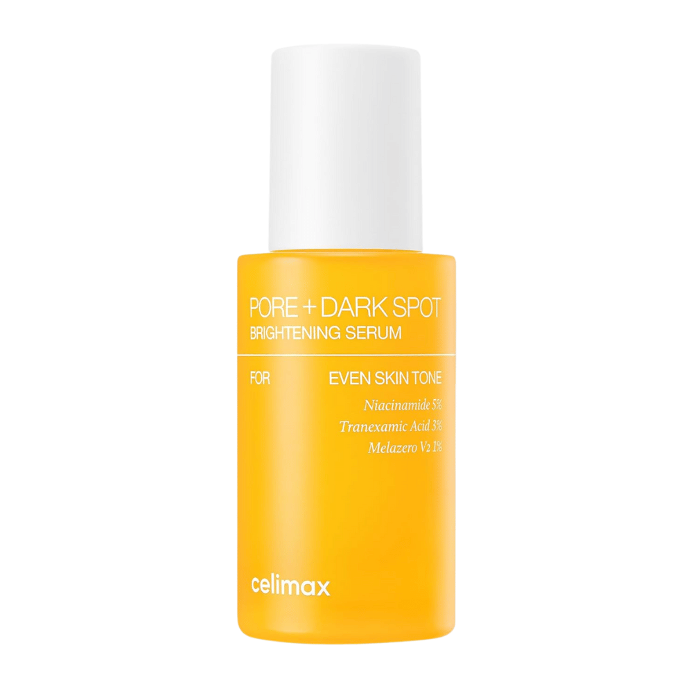 Celimax Pore + Dark Spot Brightening Serum v stoječi rumeni steklenički z belim pokrovom, vsebuje niacinamid, traneksaminsko kislino in Melazero.