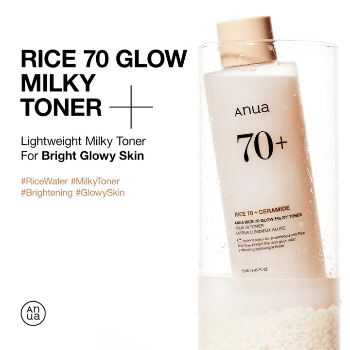 Steklenica "Anua Rice 70 Glow Milky Toner". To je lahek mlečni tonik, zasnovan za svetlo in sijočo kožo. Izdelek je obogaten z riževo vodo in ceramidi, kar je poudarjeno na etiketi steklenice. Ta tonik je idealen za doseganje sijoče kože s svežim, lahkim občutkom.