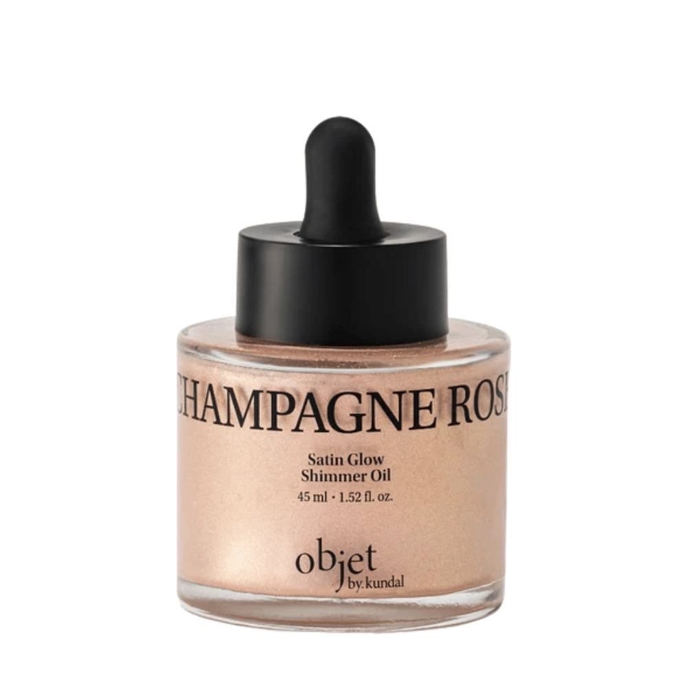 Objet by KUNDAL Satin Glow Shimmer Oil Champagne Rose 45 ml – olje za telo, ki daje lesk, z nežnim rožnato zlatim bleščečim zaključkom.