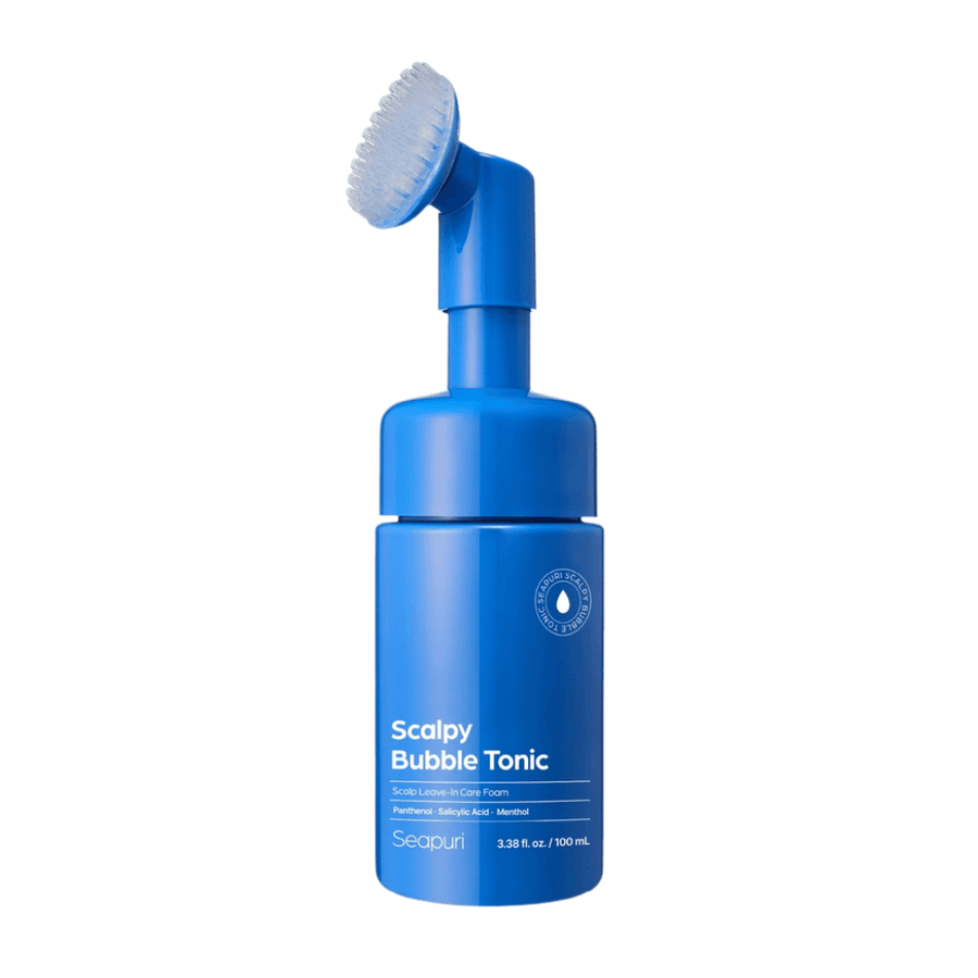 Izrezana produktna slika Seapuri Scalpy Bubble Tonic, ki prikazuje modro stekleničko z vgrajeno silikonsko krtačko za enostaven in higieničen nanos neposredno na lasišče.