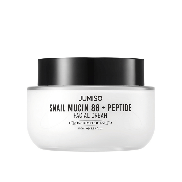 JUMISO Snail Mucin 88 + Peptide Facial Cream v beli posodi s črnim pokrovom. Krema za obraz z 88 % polžjega sekreta in peptidi za intenzivno nego kože in vlaženje.