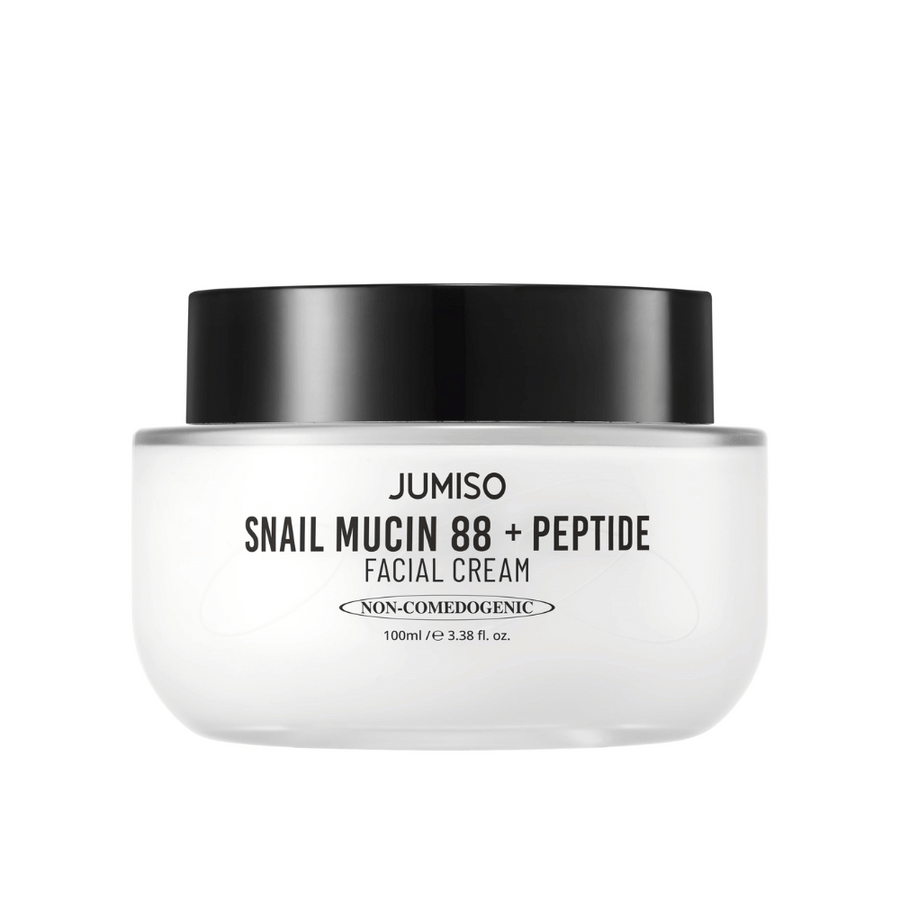 JUMISO Snail Mucin 88 + Peptide Facial Cream v beli posodi s črnim pokrovom. Krema za obraz z 88 % polžjega sekreta in peptidi za intenzivno nego kože in vlaženje.