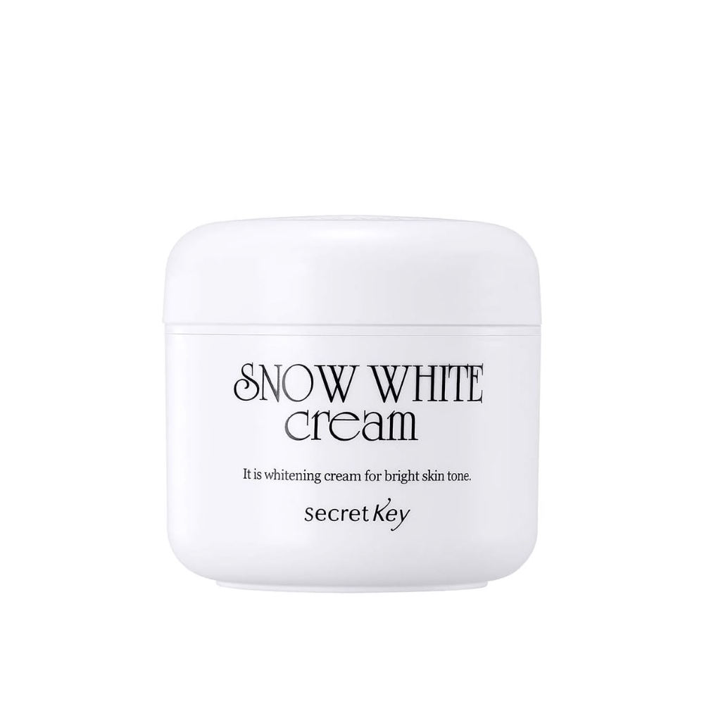Slika izdelka Secret Key Snow White Cream v beli posodi s črnim besedilom na beli podlagi.