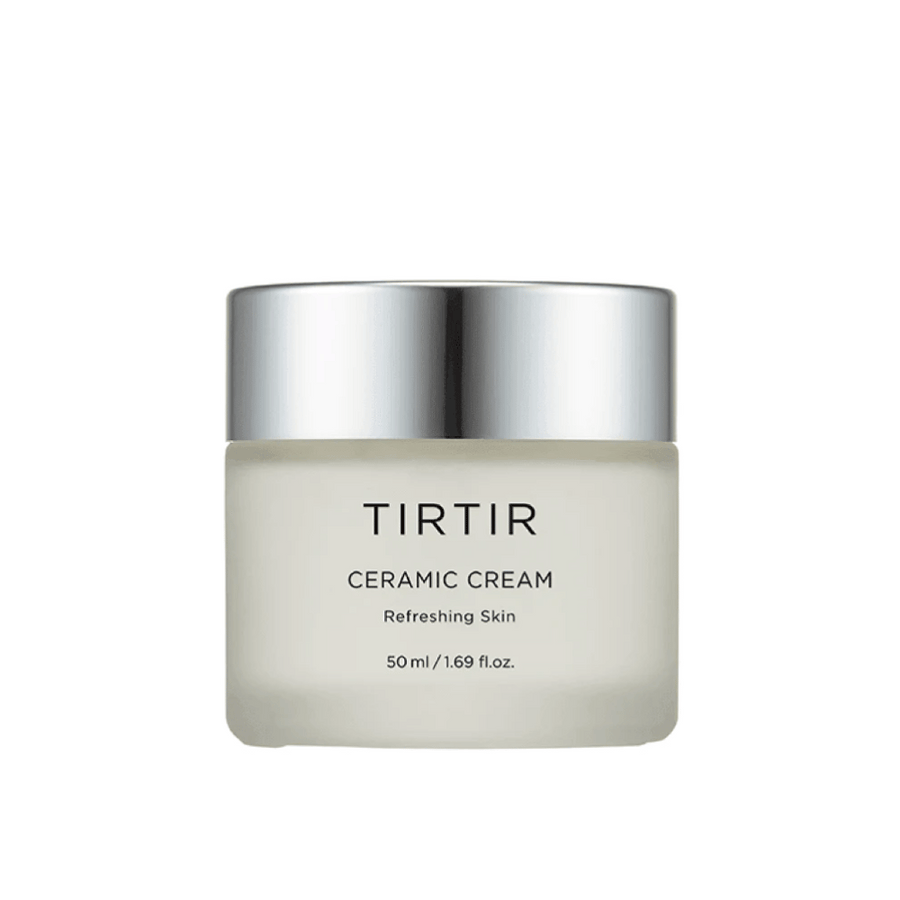 En kozarec TIRTIR Ceramic Cream, namenjen za "Osvežitev kože", z volumnom 50 ml / 1.69 fl oz. Kozarec ima prelivajočo barvo od bele do prozorne in srebrn pokrov.
