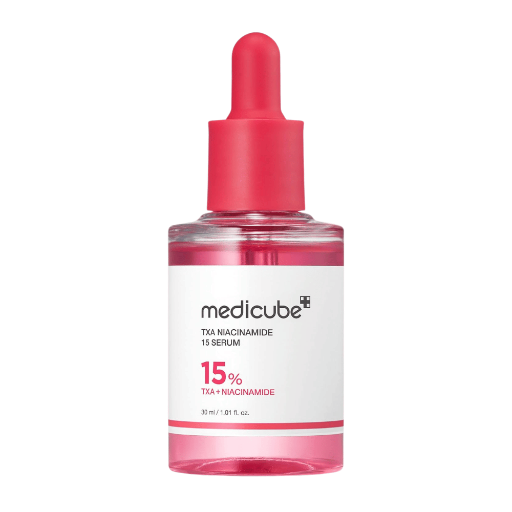 4. Medicube TXA Niacinamide 15 Serum 30 ml – rožnata steklenička seruma s pipeto na belem ozadju