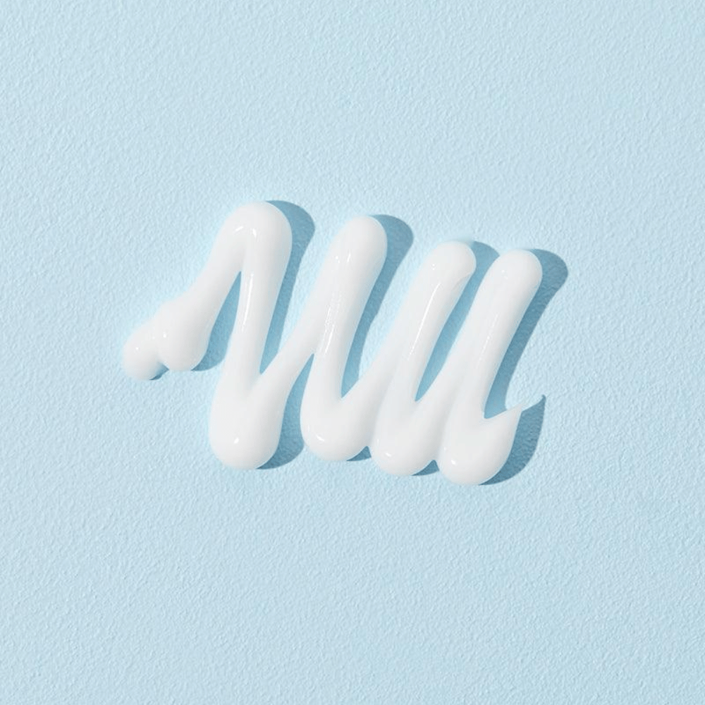 COSRX Ultimate Nourishing Rice Overnight Spa Mask bela kremasta tekstura za suho in pusto kožo