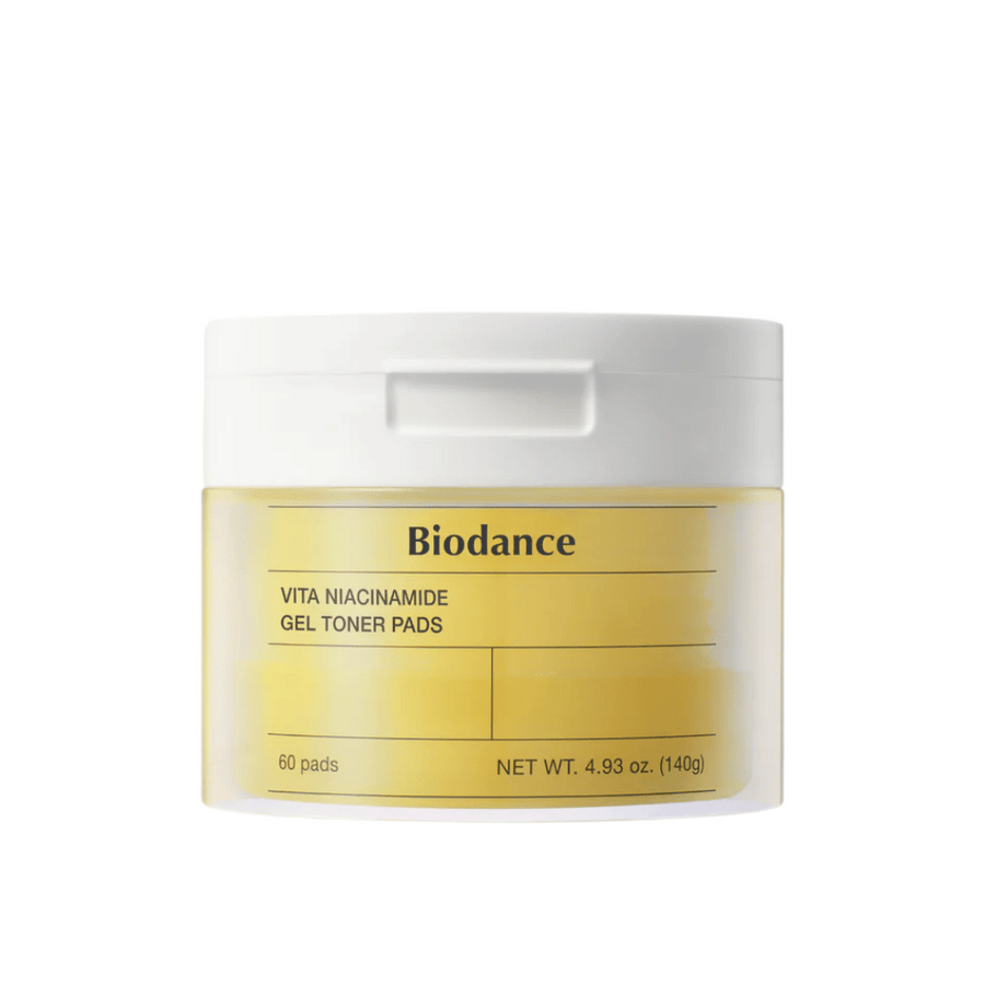 Biodance Vita Niacinamide Gel Toner Pads – pakiranje s 60 blazinicami v rumeni posodi z belim pokrovom, zasnovano za izenačevanje tena kože in sijaja.