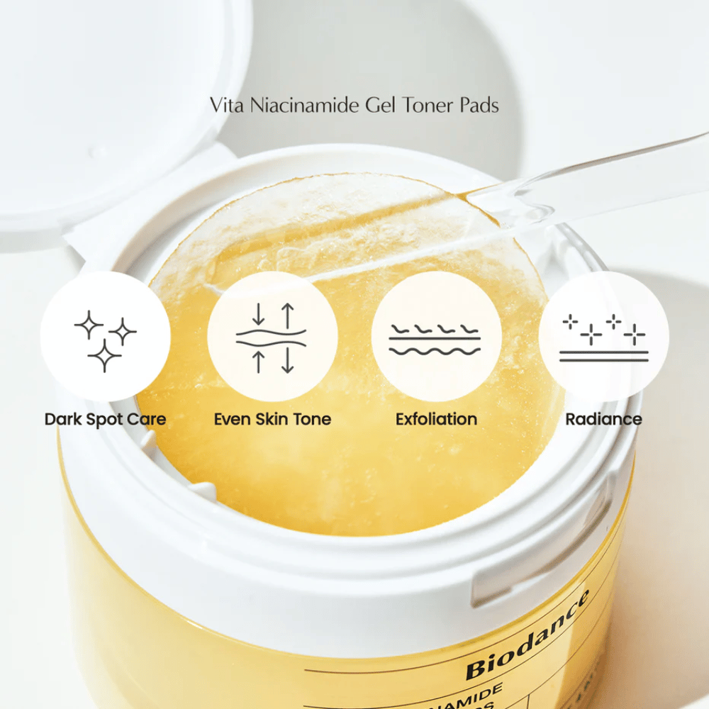 Biodance Vita Niacinamide Gel Toner Pads – eksfoliacijske blazinice za enakomernejši ten kože, sijaj in zdravljenje temnih madežev, prikazane v odprti posodi s pinceto.