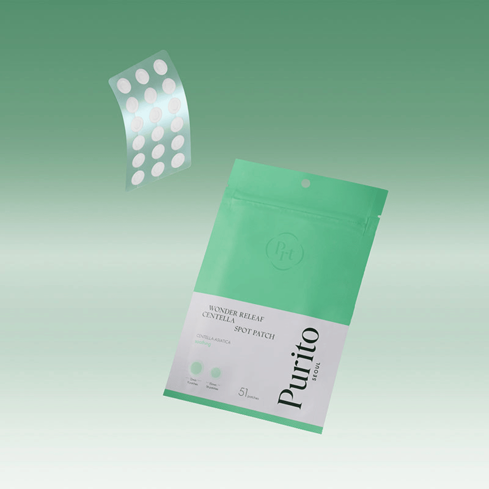 Purito Wonder Releaf Centella Spot Patch z embalažo in prozornimi obliži za akne, pomirjujoča točkovna obdelava s centella asiatica za mozolje in razdraženo kožo.