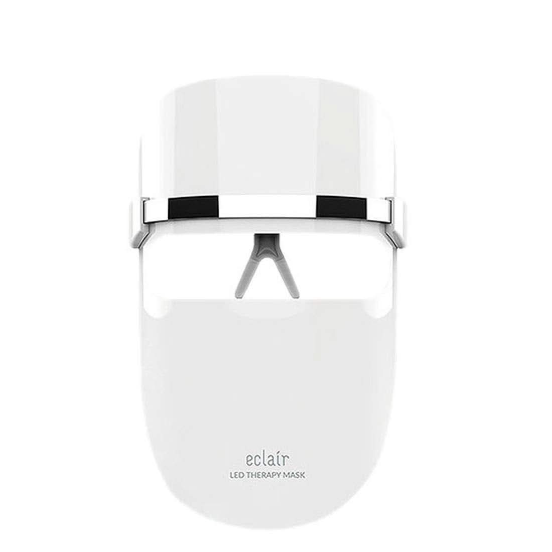 Ena ECLAIR LED Therapy Mask na beli podlagi z izboljšavami kože.