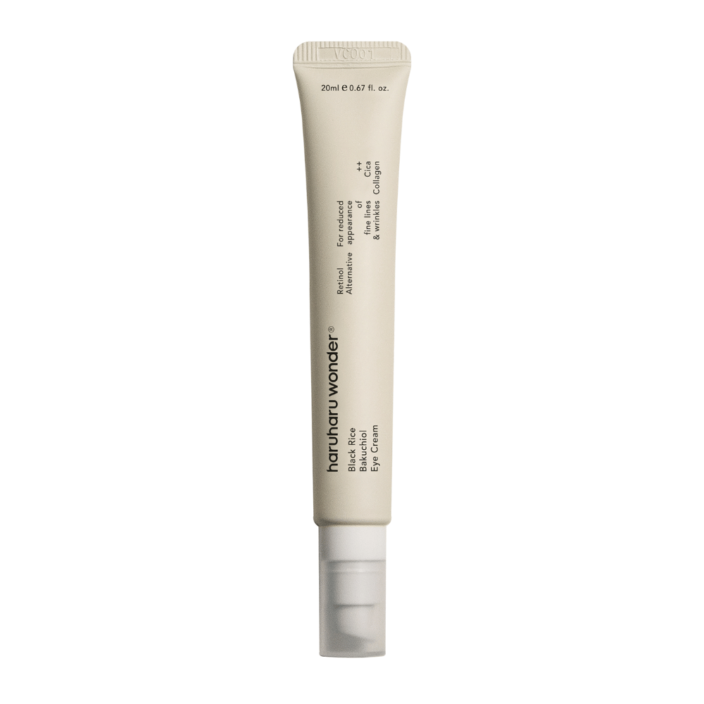Ena tuba Haruharu Wonder Black Rice Bakuchiol Eye Cream 20ml na beli podlagi za zmanjšanje vidnosti drobnih linij in gub.