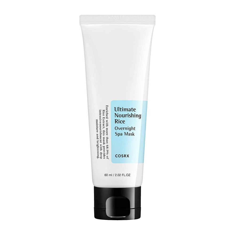 Ena tuba Ultimate Nourishing Rice Overnight Spa Mask 60ml iz COSRX na beli podlagi, zasnovana za posvetlitev kože.