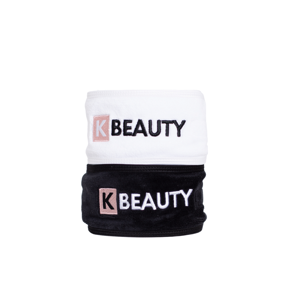 Dva črno-bela K-Beauty Makeup trakova za lase z besedo lepota.